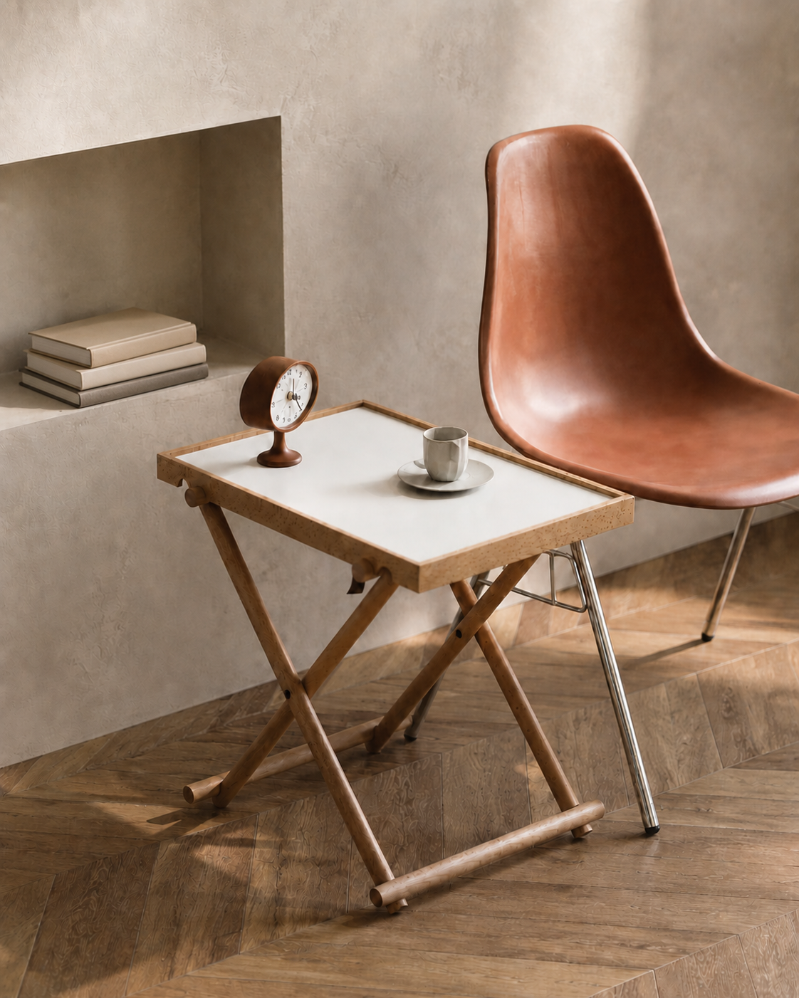 Pearl White Aster folding side table in a warm modern interior with books