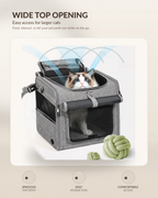 Cat inside a wide top-opening gray pet carrier with mesh panels