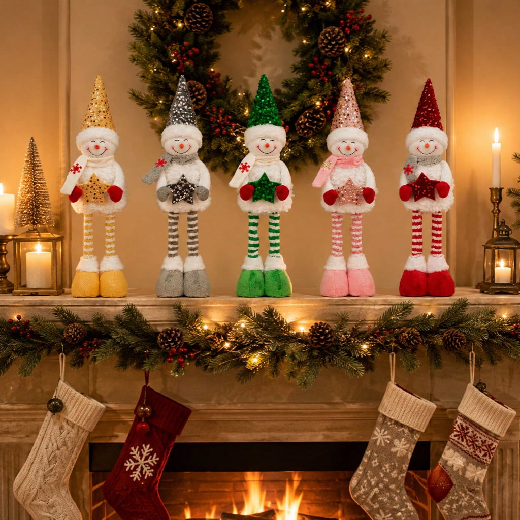 Five Christmas snowman dolls displayed on a holiday fireplace mantel