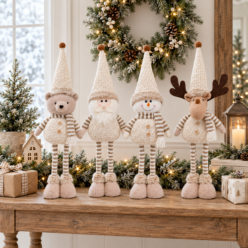 Neutral Christmas figurine set with bear, Santa, snowman and reindeer on an entryway table