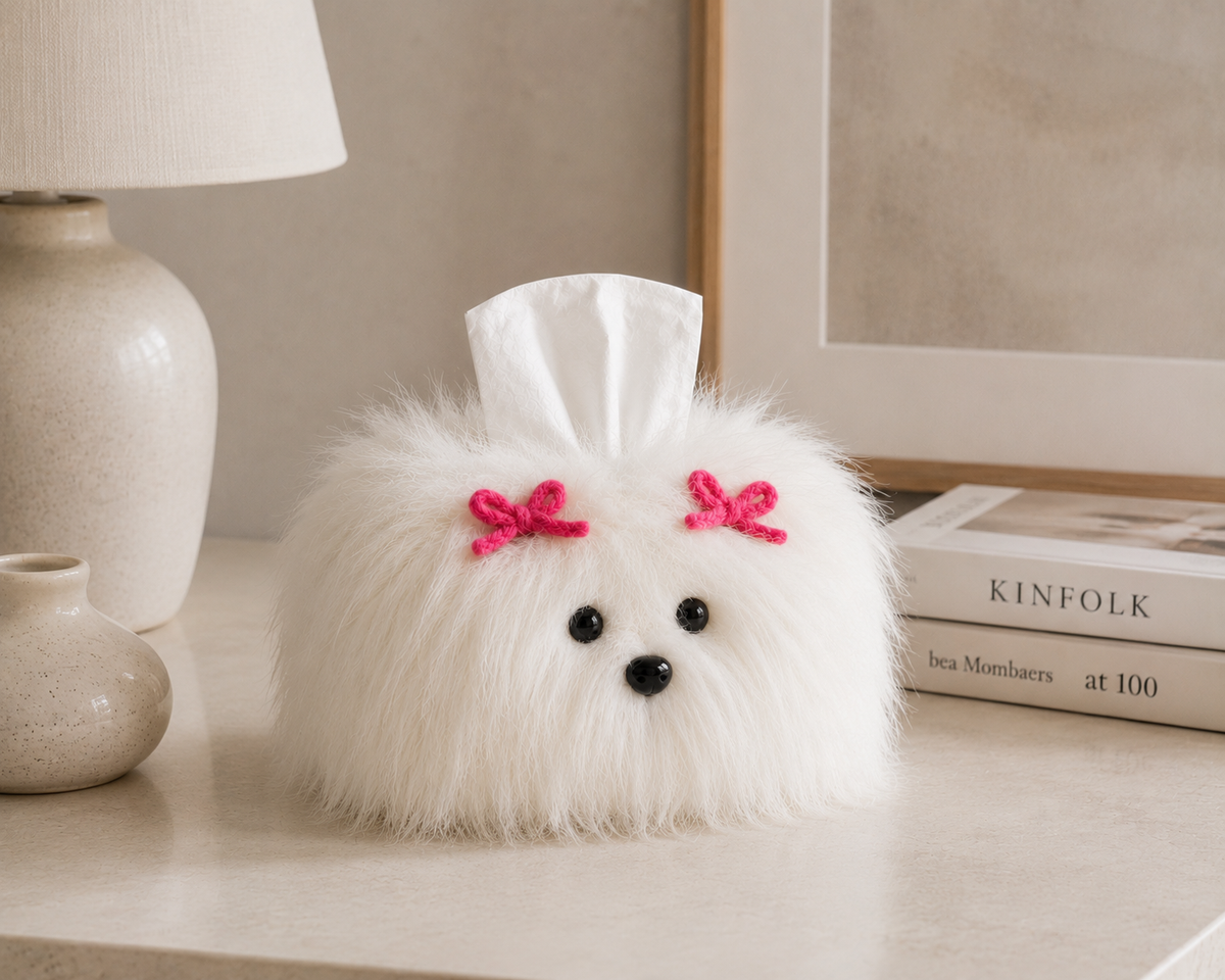 White shaggy dog tissue box cover styled on a tabletop